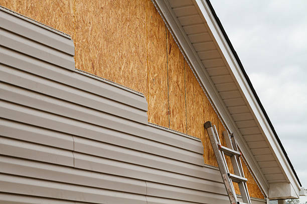Professional Emergency Siding Repair technician working in Nevada, OH